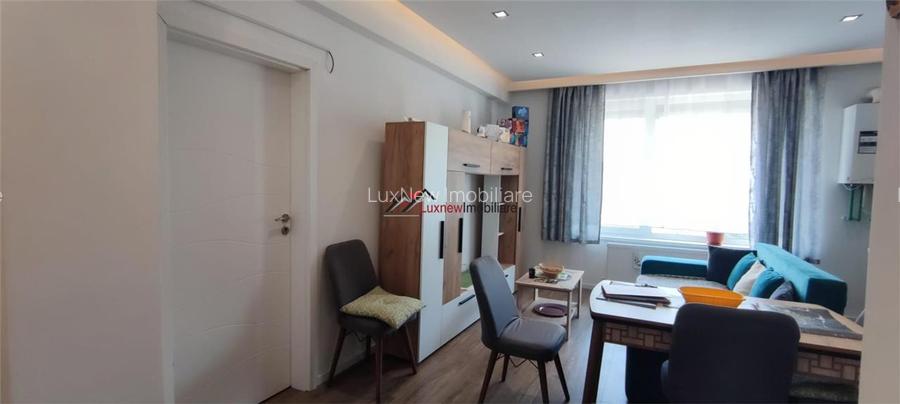 Apartament cu 2 camere, mobilat 45,6 mp utili plus balcon, garaj subteran zona T - 4