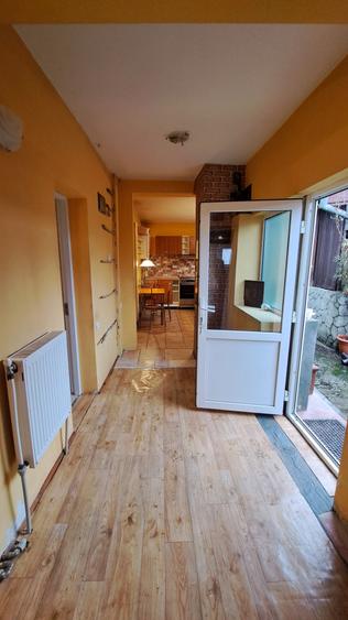 TEREN CU CASA DEMOLABILA