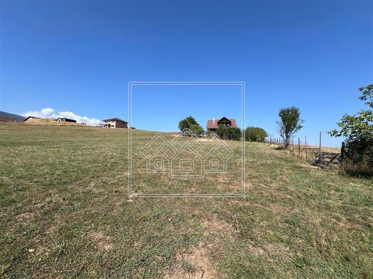 Casa de vanzare - Teren 2600 mp, 4 camere - Tocile