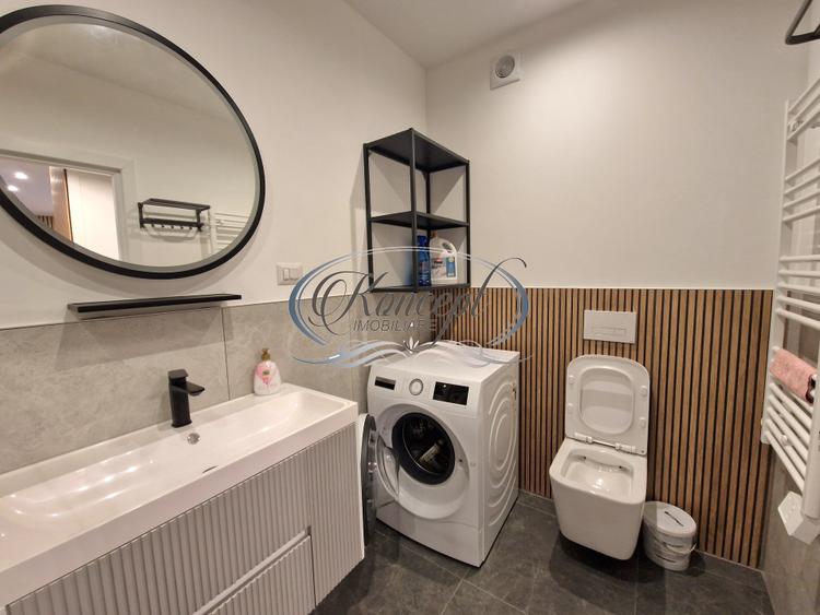Apartament mobilat cu parcare subterana si terasa