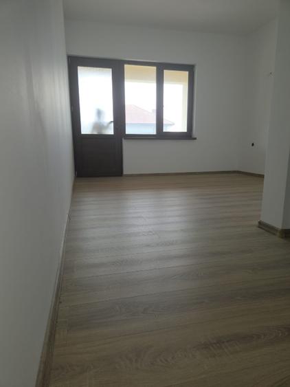 Casă nouă + teren 1.000 mp de vânzare în Murighiol