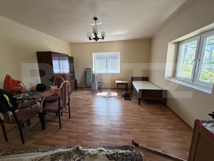 Casă cu 4 camere, 100 mp, teren 2500 mp, zona Garcei
