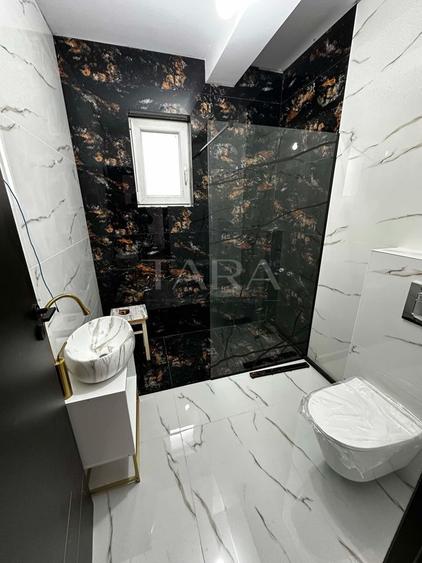 Apartament cu 3 camere, bloc tip vilă, etaj 1.