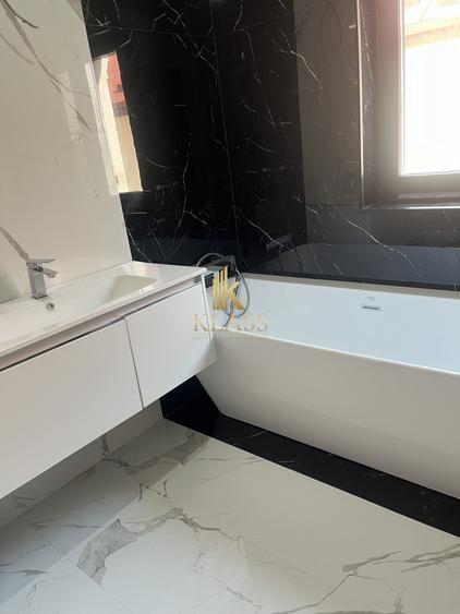 Vila individuala noua, 300 mp, 4 camere, 3 bai, curte, parcare, zona 1 Decembrie