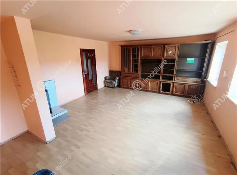Casa cu 4 camere si 1650 mp teren la doar 30 km distanta de Sibiu