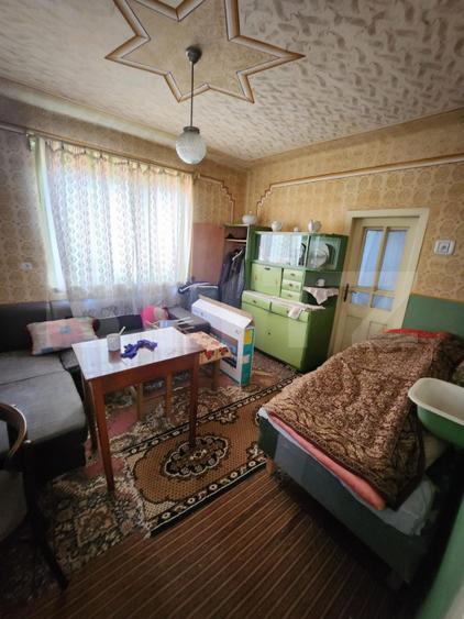 Casă de vânzare, cu teren în suprafață de 400 mp