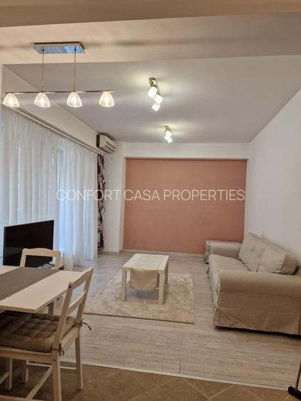 ASE -  Romana - Dorobanti - 2 camere - mobilat utilat  modern - centrala termica - 21