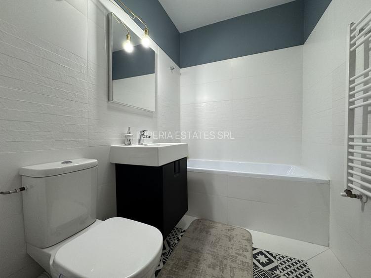Apartament mobilat, terasa 33 mp, 2 dormitoare, garaj - 12
