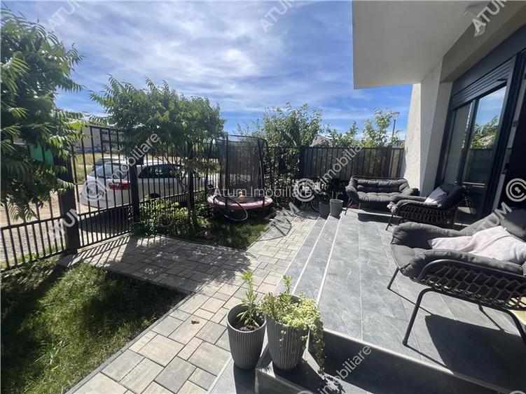 Apartament cu 3 camere si gradina proprie de 85 mp zona Brana - 14