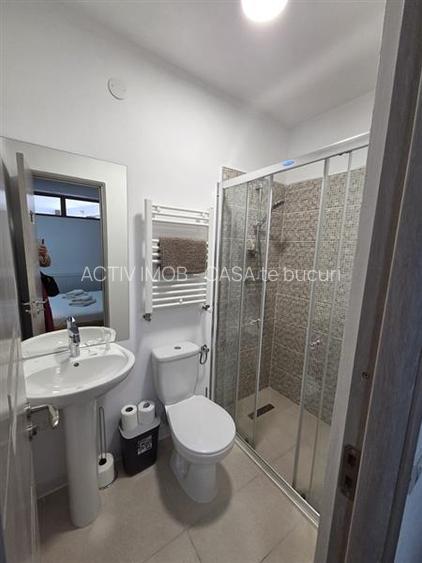 vila cu 3 apartam., spalatorie, teren 316 mp, Fedelesoiu, Daesti, Rm. Valcea - 10