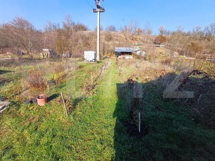 Casa + 20 arii teren, distanta 30 km de Bistrita