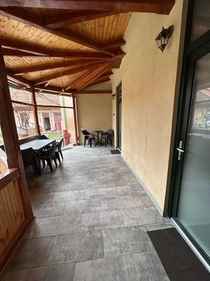 Casa individuală cu acces prin curte comuna