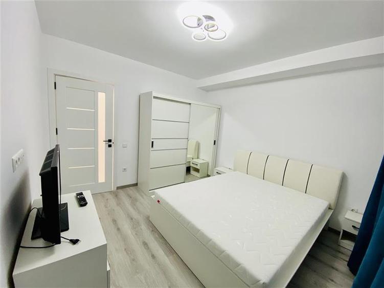 Ap. 2 camere si gradina, mobilat si utilat modern, zona D. Stanca