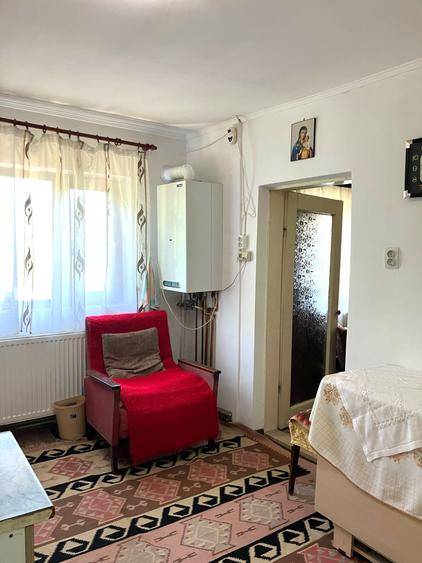 Casa  cu parau la limita proprietatii- zona submontana