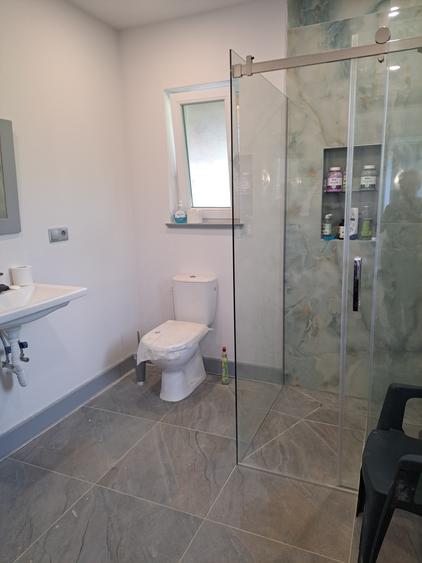 CASA NOUA PE UN NIVEL CU 4 CAMERE DOUA  BAI,LIVING, BUCATARIE  19 ARI TEREN