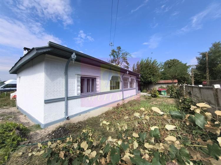 Casă cu farmec rustic și 500 mp, la 15 min de București