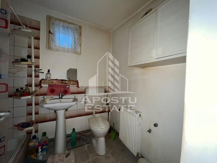 Casa individuala , cu garaj si teren de 856 mp in Ghisoda