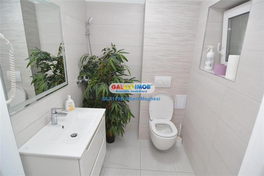Vanzare casa 8 camere renovata integral+gradina Brasov.