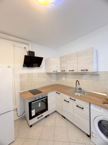 Cladire multifunctionala, pensiune plus casa, parcari private
