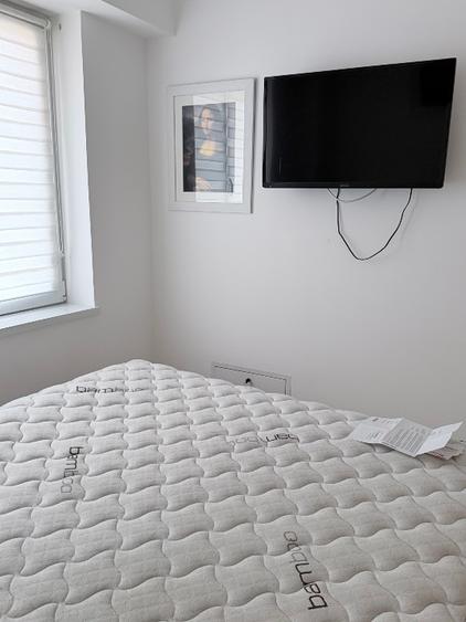 Apartament la curte cu loc de parcare