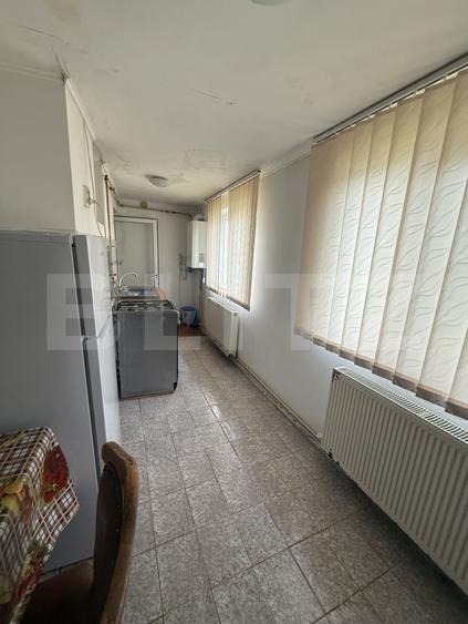 Apartament 2 camere decomandat, parter, Găești – zonă bună