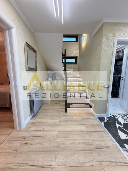 Casa P+1+M cu teren de 650 mp, piscina si curte complet amenajata