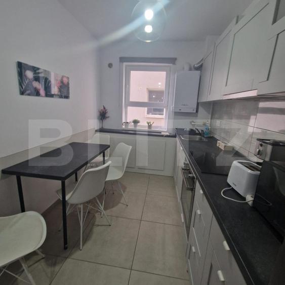 Apartament nou cu 3 camere, 2 bai -76 mp, decomandat, cu balcon -Tractorul