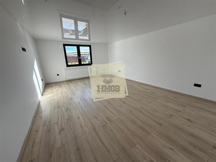 Casa cu 4 camere si 3 bai pretabila birouri in Sura  Mare
