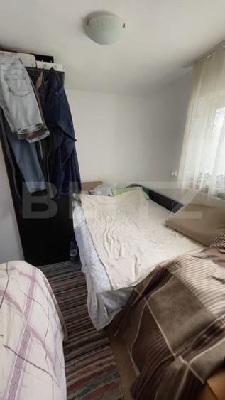 Casa 50 mp, 2.200 mp teren intravilan, zona Hintesti