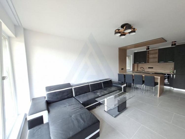 Apartament premium 61.4 mp utili 3 camere 2 bai curte 50 mp Cristian