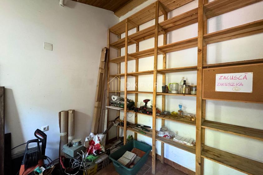 Casă rustică din lemn cu teren generos | Tofalău