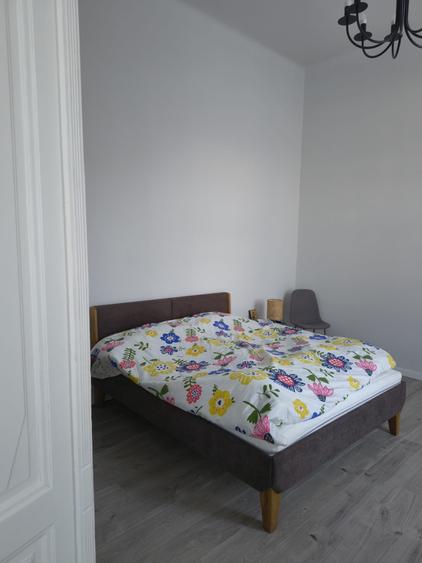 Apartament in zona centrala,finisat (cladire istorica ),mobilat,cu parcare