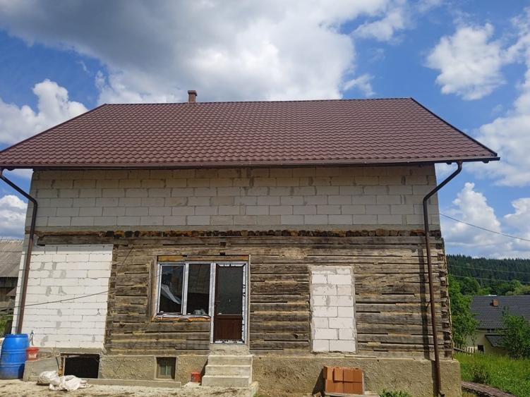 Casă cu teren 10000 mp