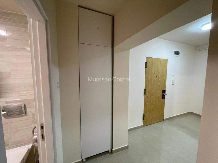 Inchiriez ap. 2 camere, minim 2 ani, renovat, garaj, et.2, lift, balcon 12 mp. - 8