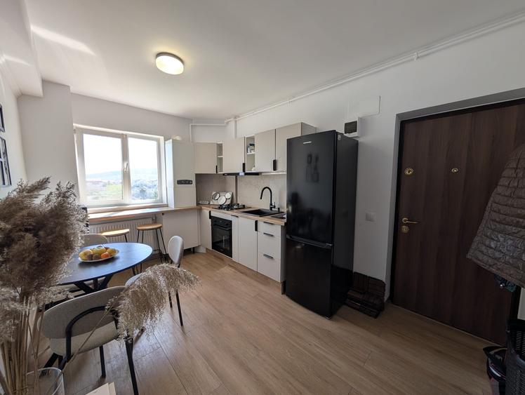 Apartament cu o camera si parcare, zona Primariei Floresti