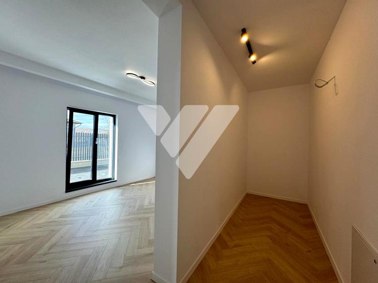 Apartament de lux 115 mp utili 4 camere 4 bai curte privata 200 mp