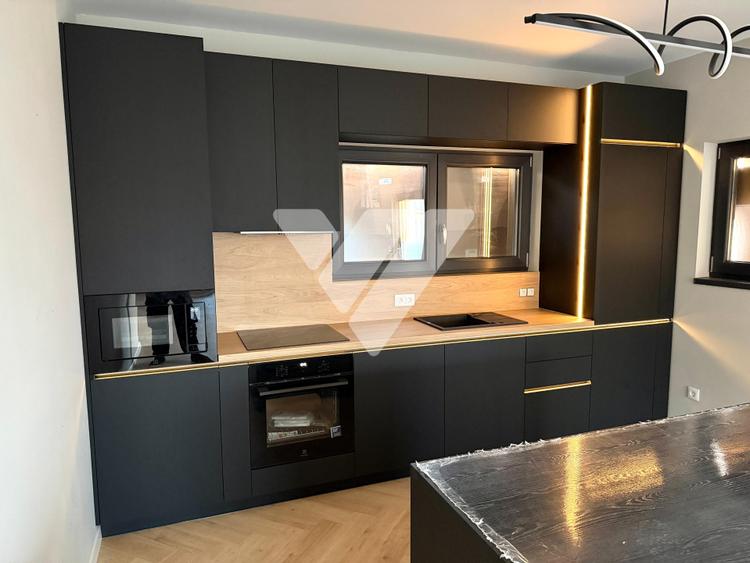 Apartament de lux 115 mp utili 4 camere 4 bai curte privata 200 mp