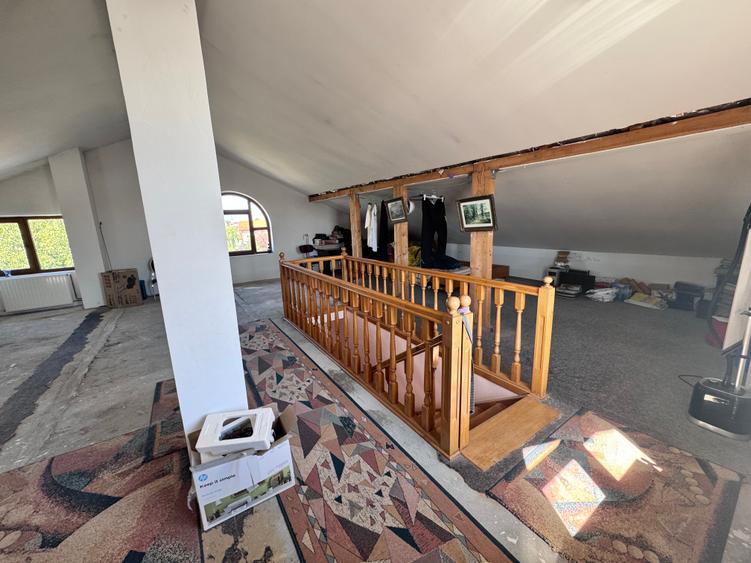 Casa individuala P+1+M amplasata pe un teren de 1612 mp.