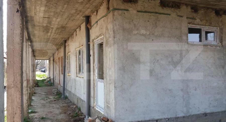 CLADIRE LA ROSU GAESTI, AFACERE