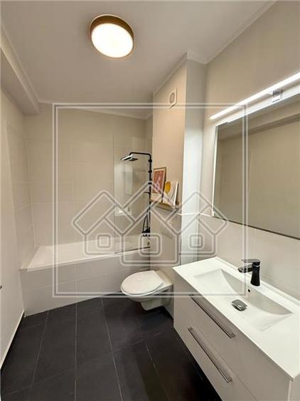 Ap 2 camere - complet mobilat si utilat modern - prima inchiriere