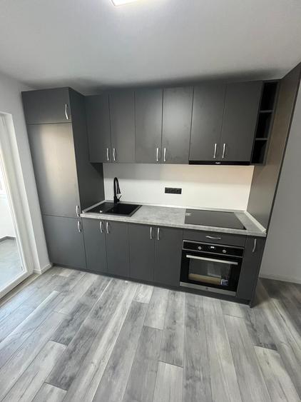 Apartament 2 camere 50mp Bradet ultrafinisat+garaj sub bloc
