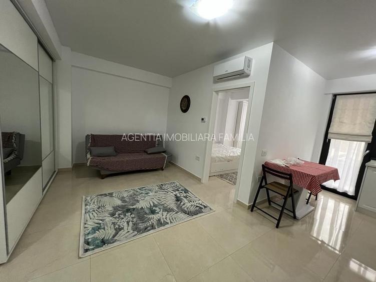 Inchiriem studio in Micro 17 , etaj 2 bloc ROKA, parcare privata, - 12