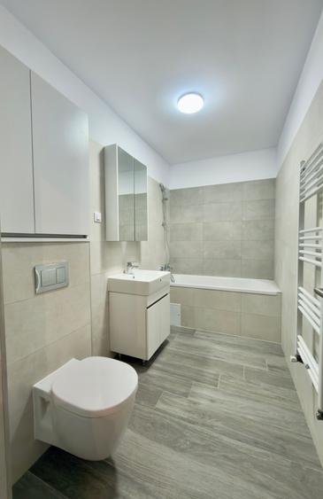 Apartament cu 2 camere de vanzare in zona Tractorul mobilat ,nou in garantie