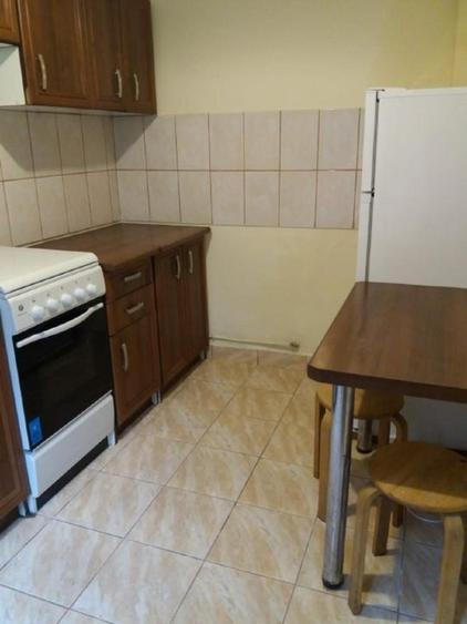 Inchiriez garsoniera la casa ,singur in curte mica