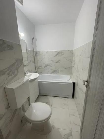 Apartament cu 2 camere, decomandat, etajul 1/4, zona Podu Ros
