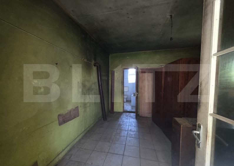 Casa de vanzare cu 2 camere,80 mp,zona sat Ambud comuna Paulesti
