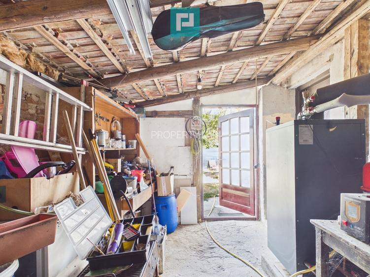 Casă individuală 3 camere,teren de 1500Mp Bătania