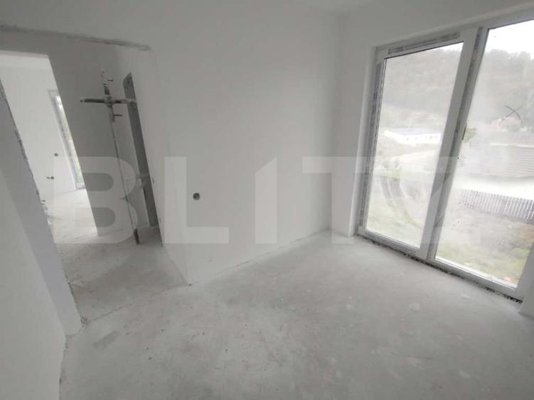 Casa 111 mp,pe 2 nivele cu 4 camere,570 mp teren,zona Valea Jelnei