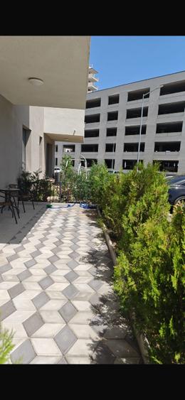 Apartament 2 camere cu terasa proprie și loc de parcare