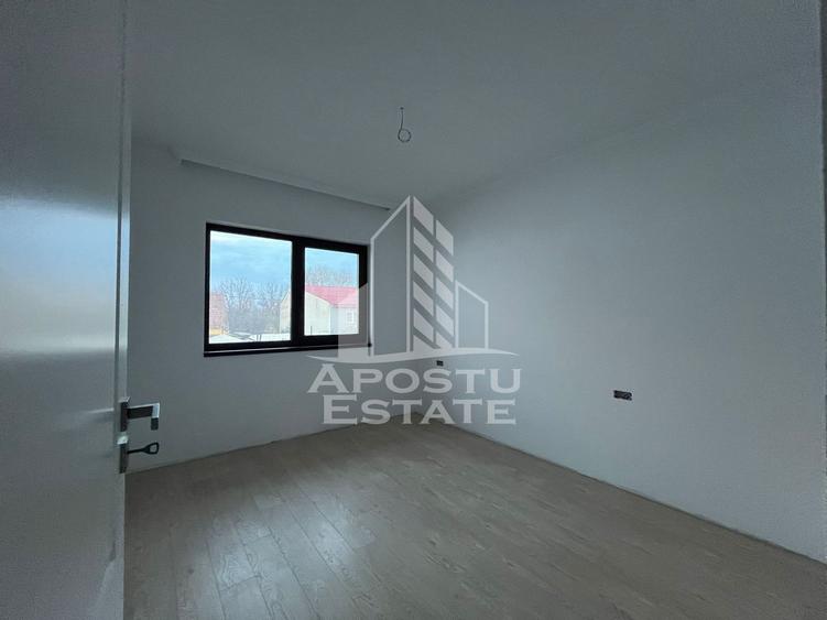 Duplex cu 4 camere, 3 bai,teren 250 mp in zona Dambovita